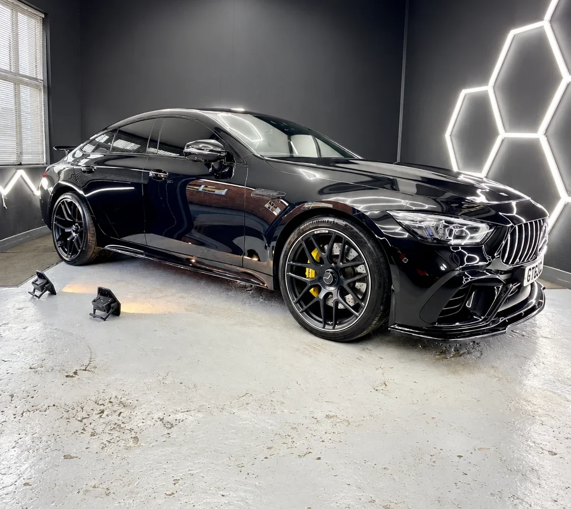 Black BMW coupe in the SJ Detailing studio in Leicester